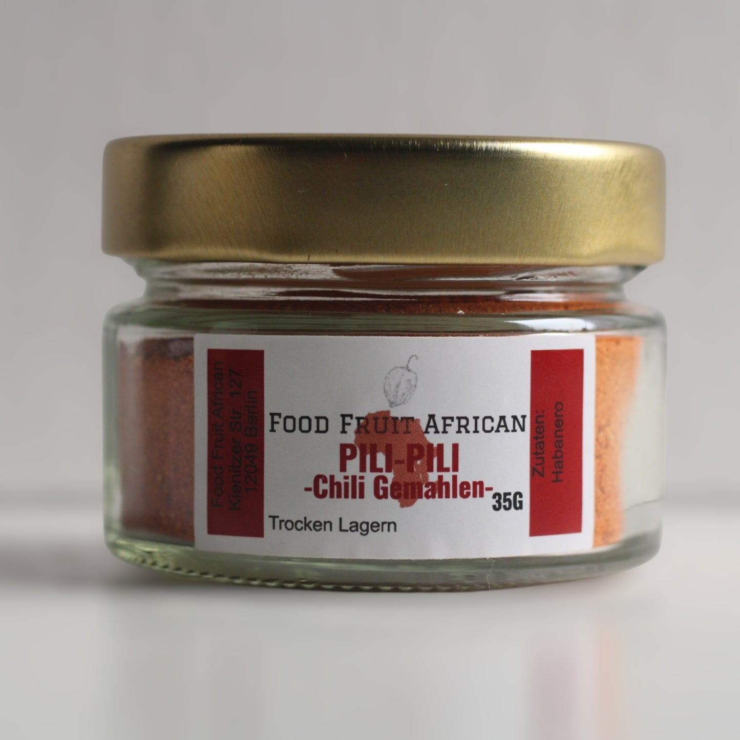 Pili-Pili Chili gemahlen. Wundervoll aromatisch. Verfeinert jedes scharfe Gericht.